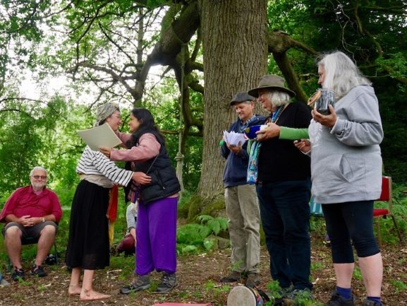 small Handing out certificates under G Oak