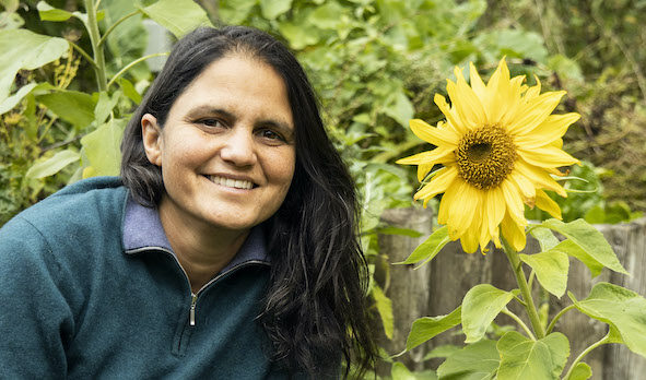 Looby smiling and sunflower